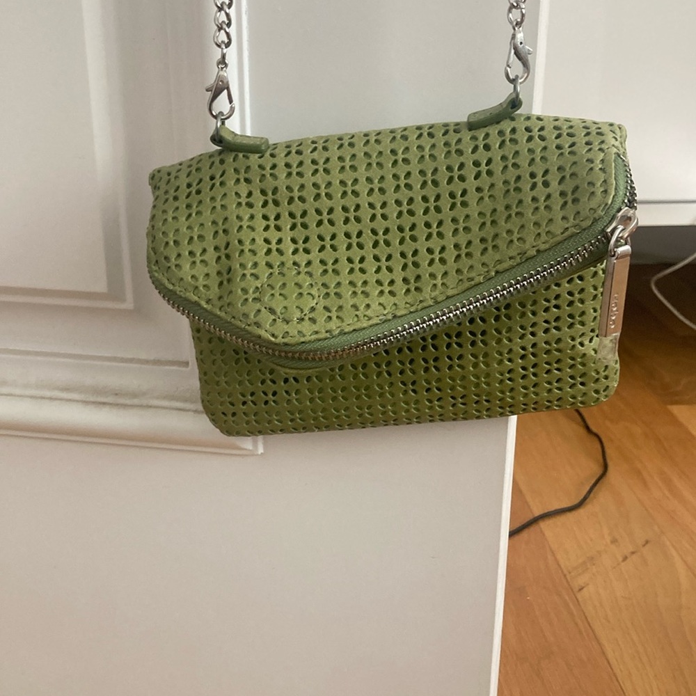 Hobo clutch bag with add-on shoulder strap